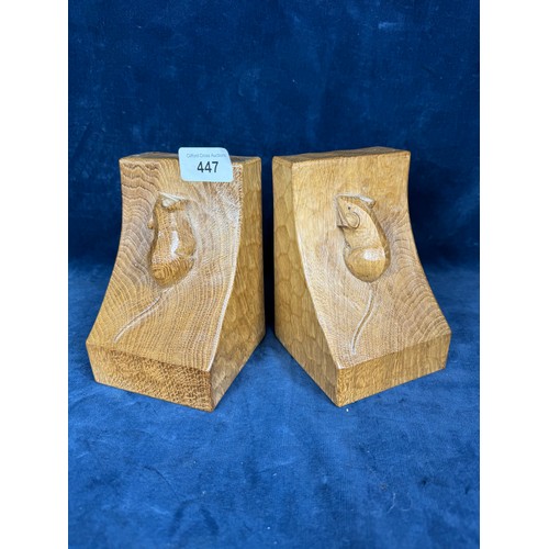 447 - A pair of handcarved solid oak, light fume, bookends by Robert 