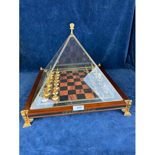 449 - A Franklin Mint 24 ct gold plated embellished Egyptian themed chess set on wooden base with square d... 