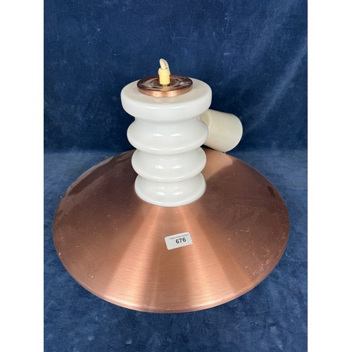 676 - A copper coloured light fitting with opaque glass stem