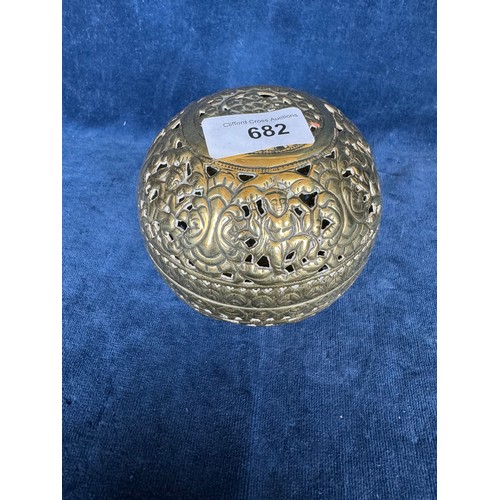 682 - A vintage brass Indian hand warmer comprising 2 hemispherical interlocking parts having pierced and ... 