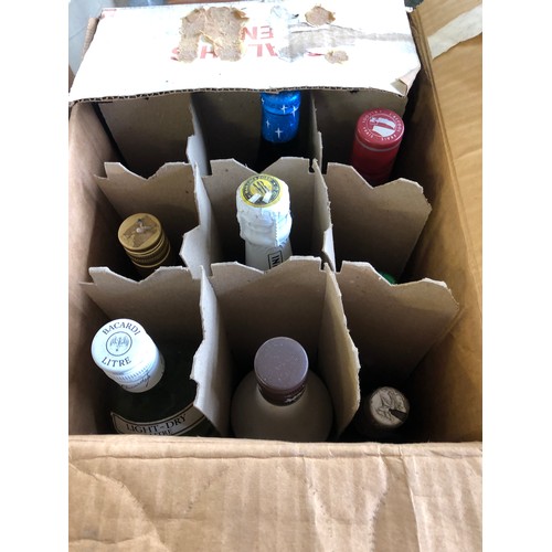 438 - A box of 12 bottles of alcohol