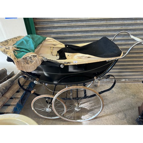 23 - A vintage Osrath pram.