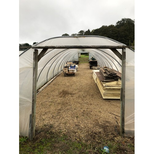 49 - A single span Polytunnel with irrigation piping and cover