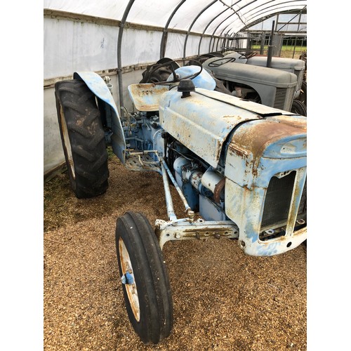 554 - A Fordson Super Dexter vintage tractor with frame to hold a safety bar. No 09D913 459. Built by Ford... 