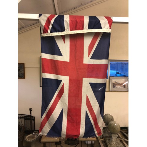 26 - A vintage union jack flag, approximately 175cm x 90cm.