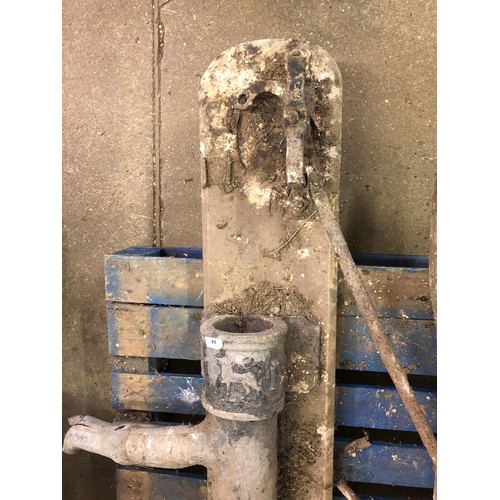 25 - An antique lead water pump marked 