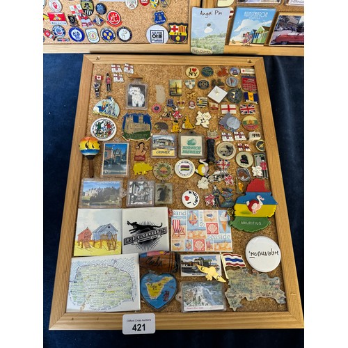 421 - Three cork boards containing a large quantity of pin badges and magnets of various location for UK a... 