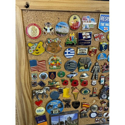 421 - Three cork boards containing a large quantity of pin badges and magnets of various location for UK a... 