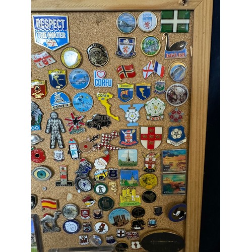 421 - Three cork boards containing a large quantity of pin badges and magnets of various location for UK a... 