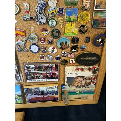 421 - Three cork boards containing a large quantity of pin badges and magnets of various location for UK a... 