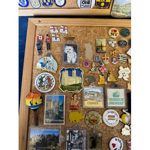 421 - Three cork boards containing a large quantity of pin badges and magnets of various location for UK a... 