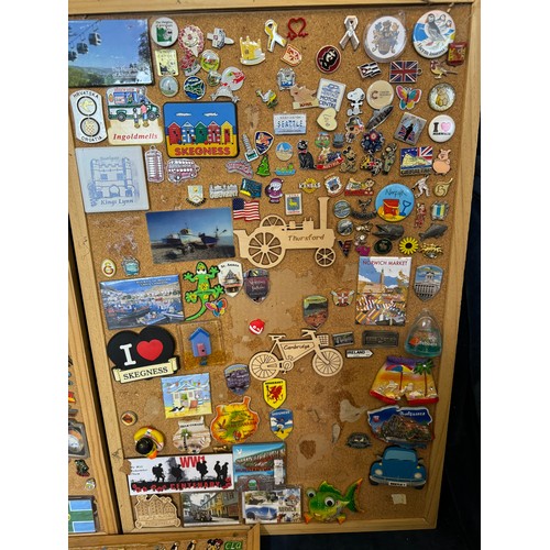 422 - Three cork boards containing a large quantity of pin badges and magnets of various location for UK a... 