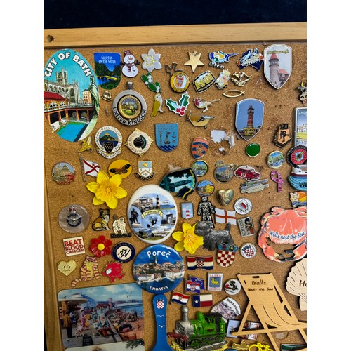 422 - Three cork boards containing a large quantity of pin badges and magnets of various location for UK a... 