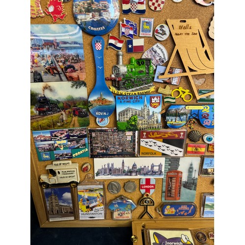 422 - Three cork boards containing a large quantity of pin badges and magnets of various location for UK a... 