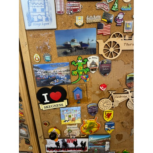 422 - Three cork boards containing a large quantity of pin badges and magnets of various location for UK a... 