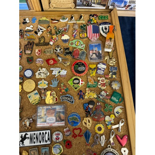 422 - Three cork boards containing a large quantity of pin badges and magnets of various location for UK a... 