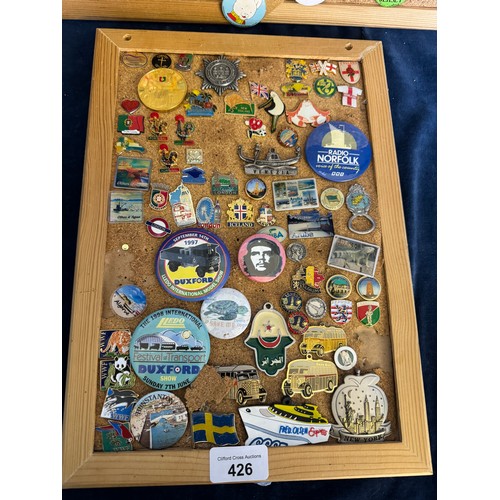 426 - Three cork boards containing a large quantity of pin badges and magnets of various location for UK a... 