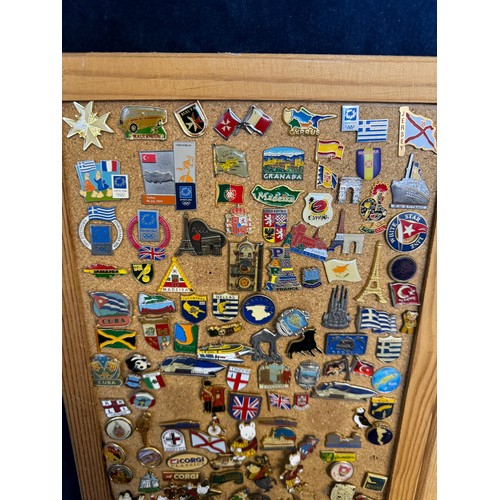 426 - Three cork boards containing a large quantity of pin badges and magnets of various location for UK a... 