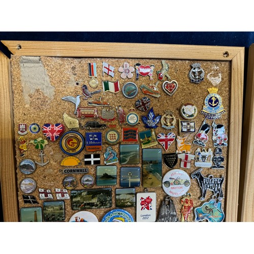 428 - Four cork boards containing a large quantity of pin badges and magnets of various location for UK an... 