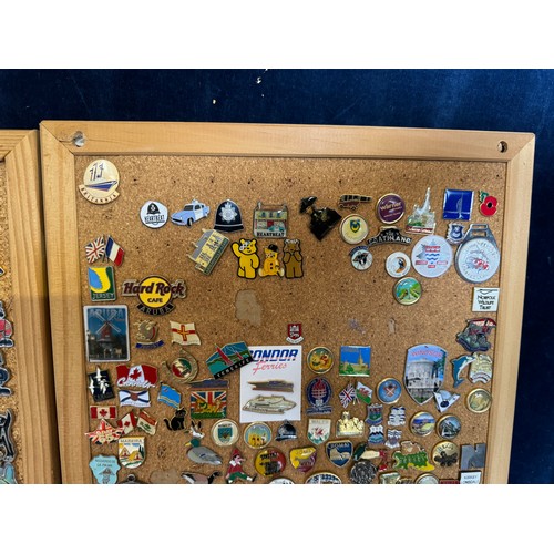 428 - Four cork boards containing a large quantity of pin badges and magnets of various location for UK an... 