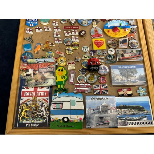 428 - Four cork boards containing a large quantity of pin badges and magnets of various location for UK an... 