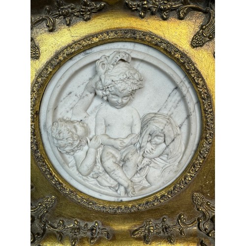 78 - An Edward William Wyon marble plaque depicting 'Children playing' in ornate gilt frame, marked to re... 