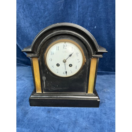 89 - A slate eight day striking dome top mantle clock made by Lewis, Plymouth