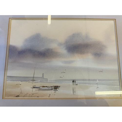 51 - A framed watercolour depicting Beach Scenes by John Lawrence.