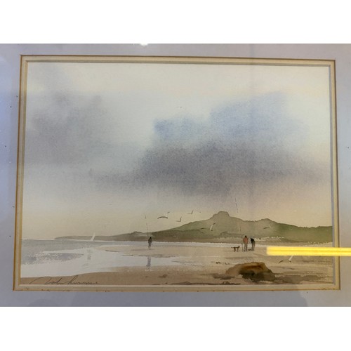 52 - A framed watercolour depicting Beach Scenes by John Lawrence.