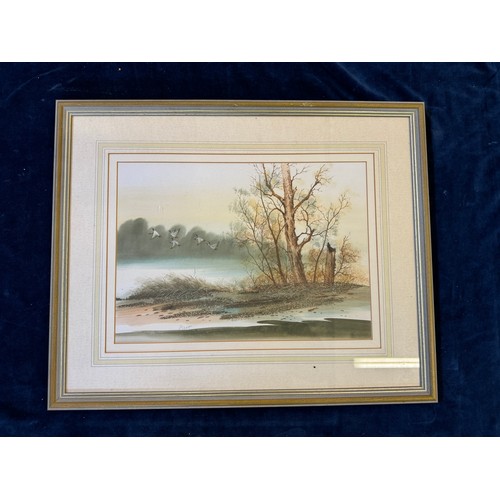 42 - A framed and signed watercolour depicting 