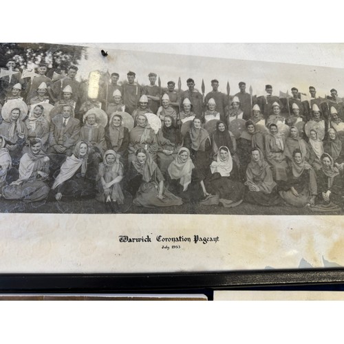 36 - A framed black and white photograph of the cast of 