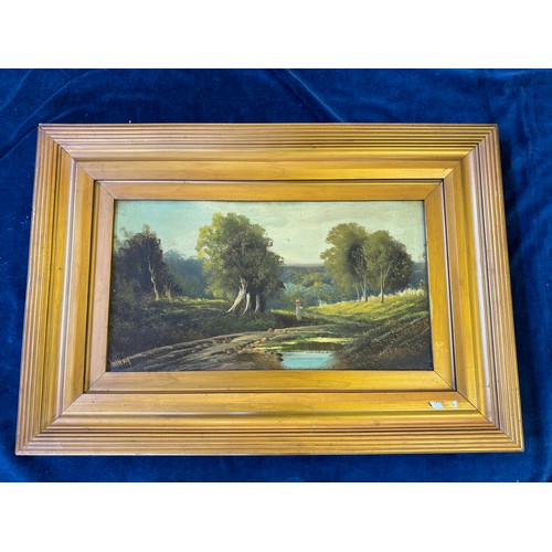 38 - A framed oil on board of lady in glade, signed W. Hay.