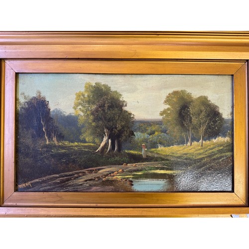 38 - A framed oil on board of lady in glade, signed W. Hay.