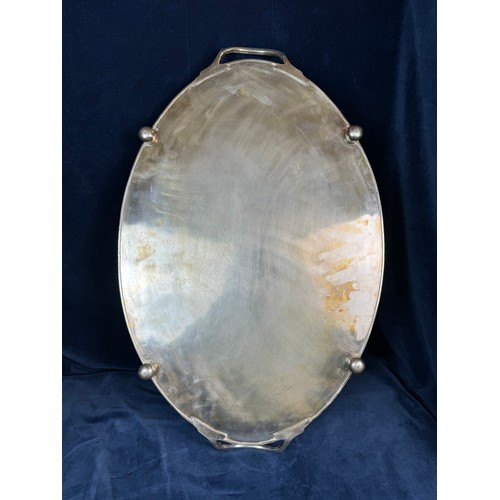 104 - A large oval silver-plate galleried tray.