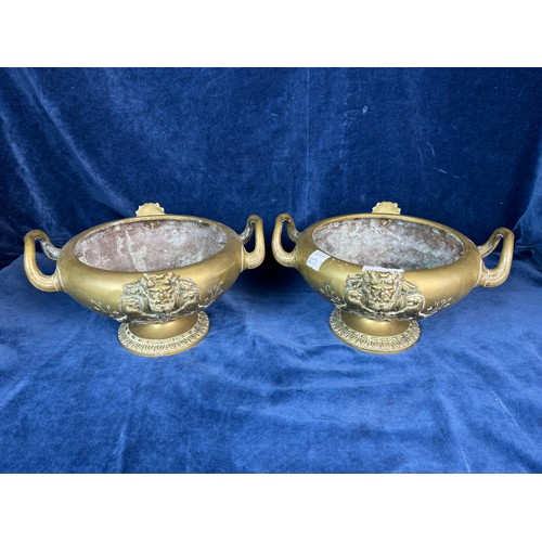 100 - A pair of Victorian French brass grape servers with pedestal bases each with a pair of handles and w... 