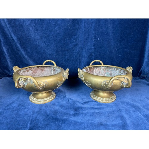 100 - A pair of Victorian French brass grape servers with pedestal bases each with a pair of handles and w... 