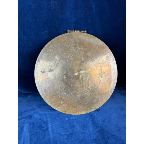 101 - A brass circular cooking pan with two handles