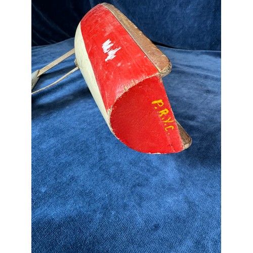 91 - A vintage wooden sailing boat with red and white paint work