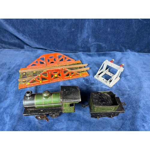 105 - A tin plate clockwork model of a Great Western steam engine and tender with model bridge and Hornby ... 