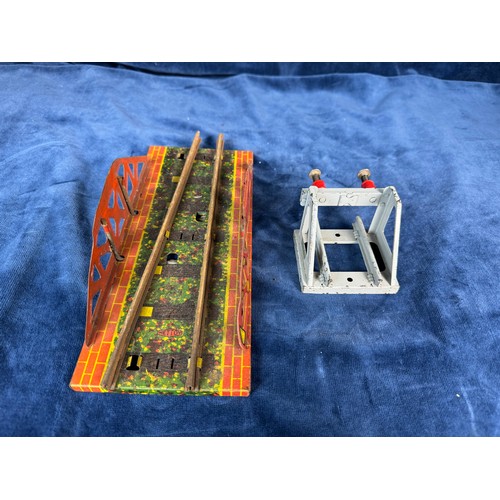 105 - A tin plate clockwork model of a Great Western steam engine and tender with model bridge and Hornby ... 