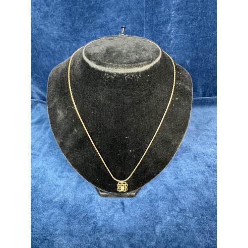 196 - A 9ct gold ladies necklace with contemporary pendant, having single stone, weighing approximately 8.... 