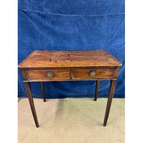 609 - An antique mahogany side table on square legs with 2 drawers under, having metal oval shaped handles... 