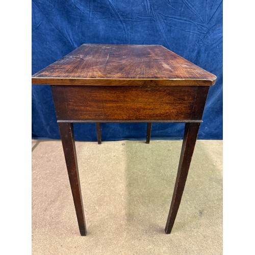 609 - An antique mahogany side table on square legs with 2 drawers under, having metal oval shaped handles... 