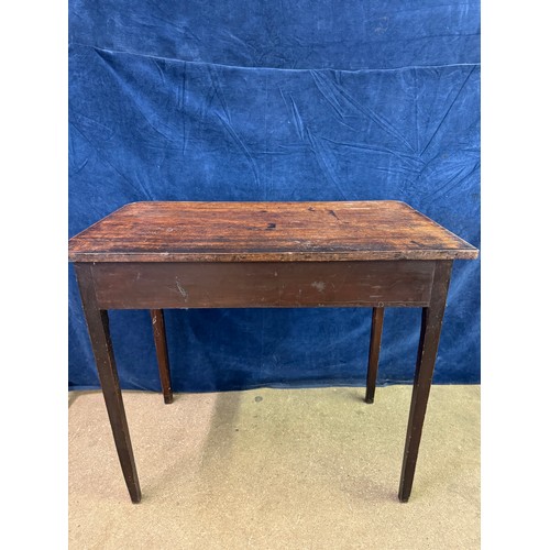 609 - An antique mahogany side table on square legs with 2 drawers under, having metal oval shaped handles... 