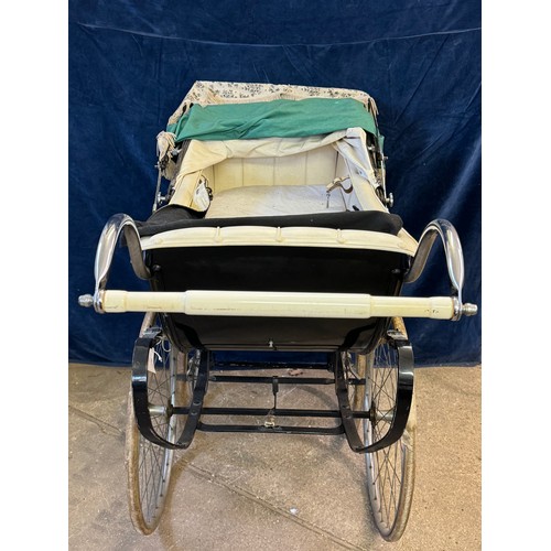 6 - A vintage Osrath pram.