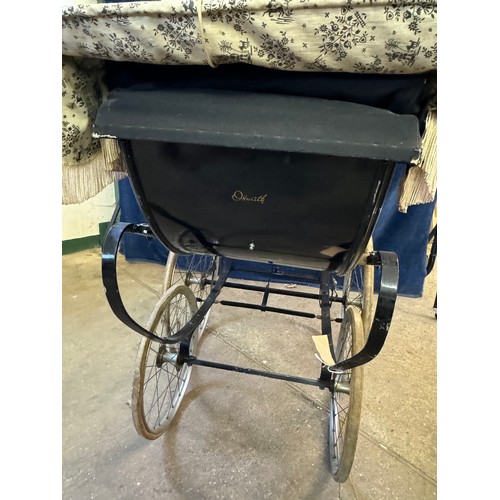 6 - A vintage Osrath pram.