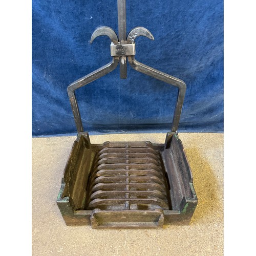 20 - An antique cast iron boot scraper with a modern back stand, named on the base 'Cooks - Norwich - Maj... 