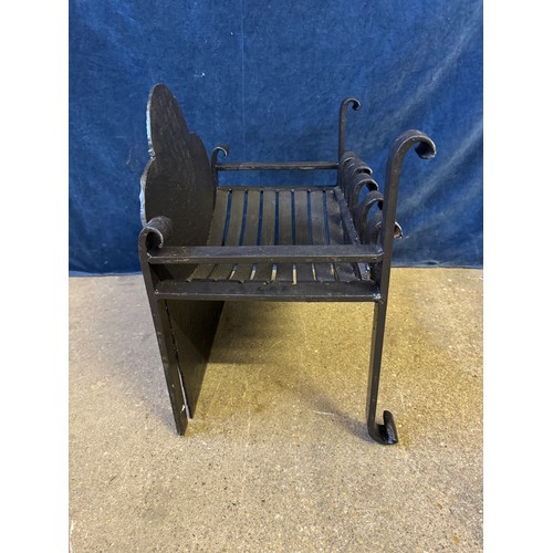 28 - A hand forged metal open fire grate.