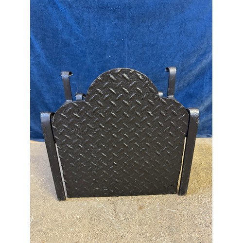 28 - A hand forged metal open fire grate.