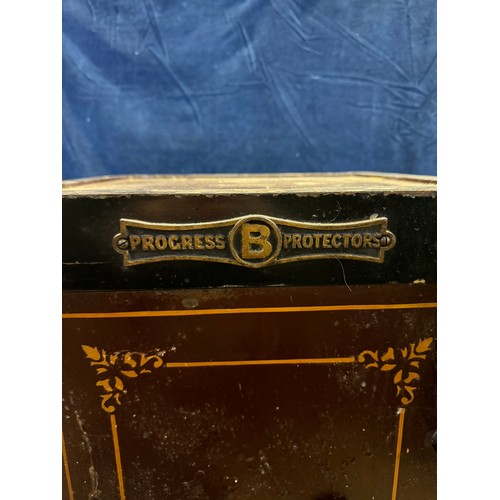 11 - A 'Progress Protectors' Hobbs & Co safe with key.